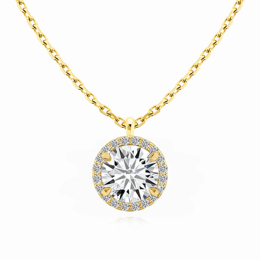 Pendentif médaillon rond Volter en or jaune 14K orné de diamants sertis quatre griffes sur fond blanc.