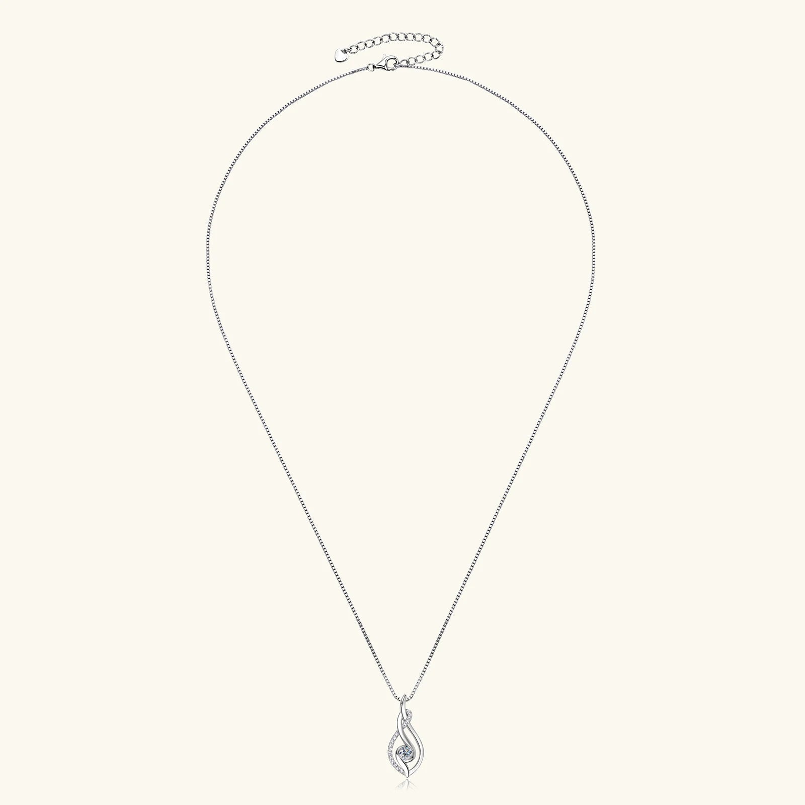 Pendentif ondulé en or blanc et diamants synthétiques en entier.