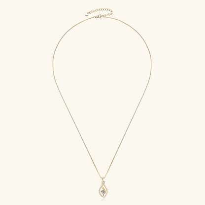 Pendentif ondulé en or jaune et diamants synthétiques en entier.