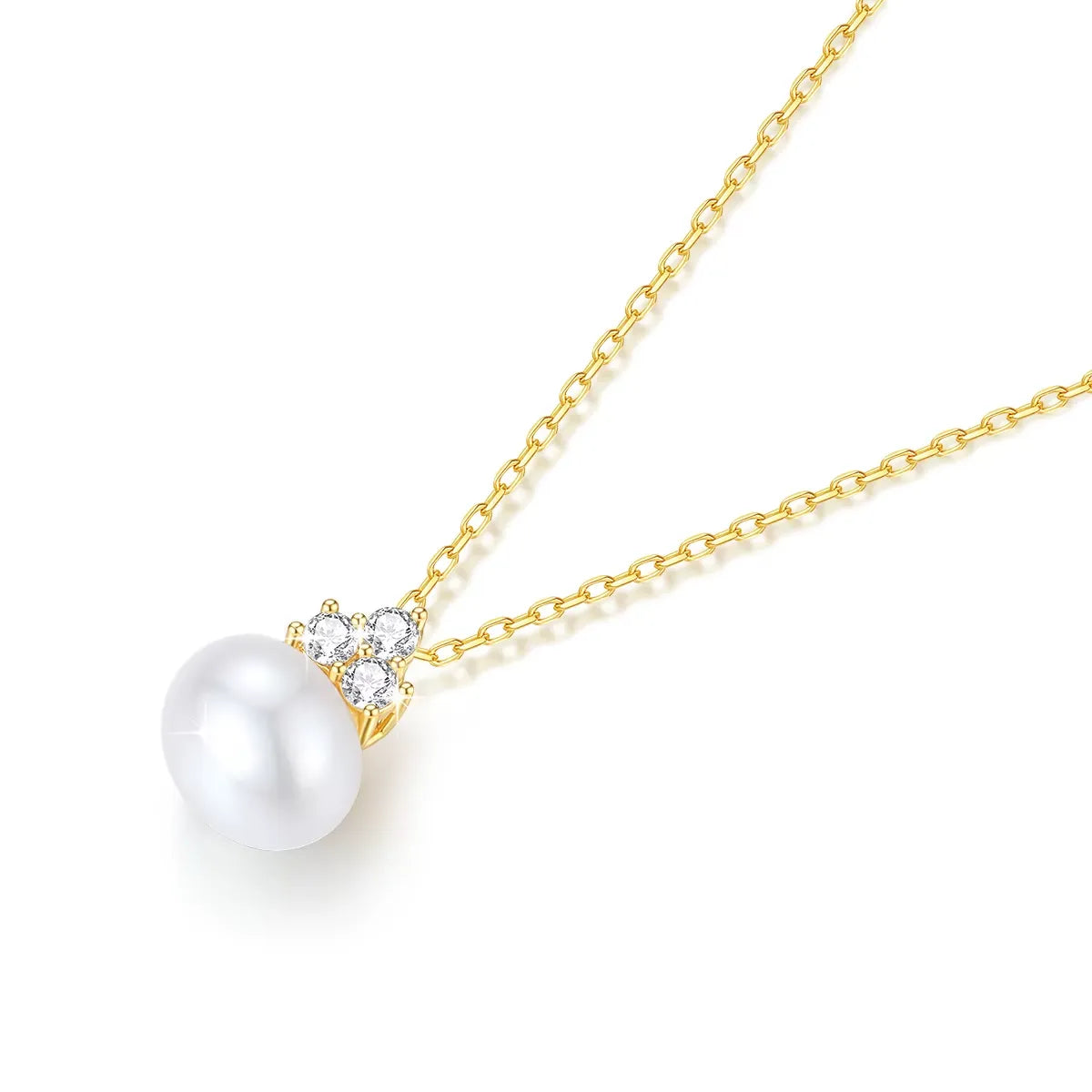 Pendentif perle solitaire en or jaune et trio de diamants synthétiques à plat.