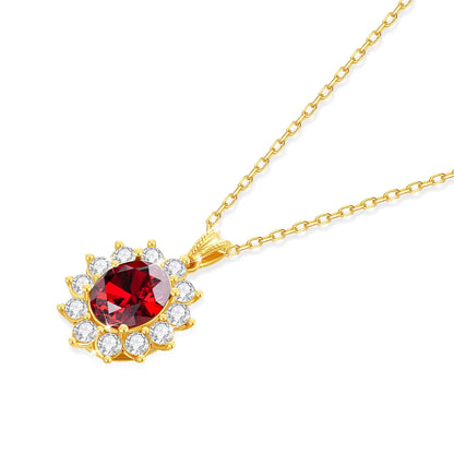 Pendentif rubis ovale couronné en or jaune 18K raffiné et diamants sertis griffes posé.