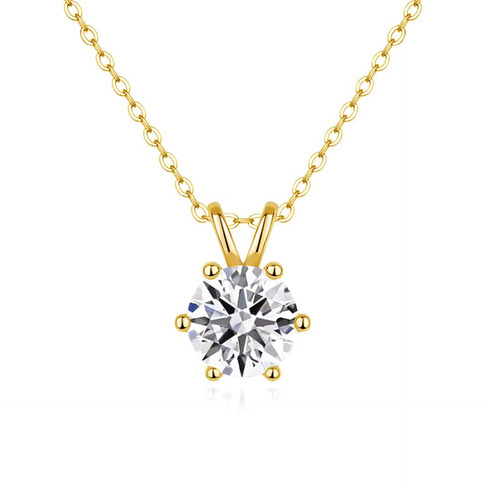 Pendentif solitaire diamant rond serti six griffes Sylaë en or jaune 14K sur fond blanc.