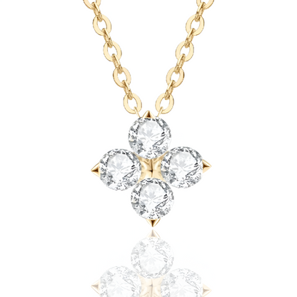 Pendentif solitaire en or jaune et diamants synthétiques sur fond blanc.