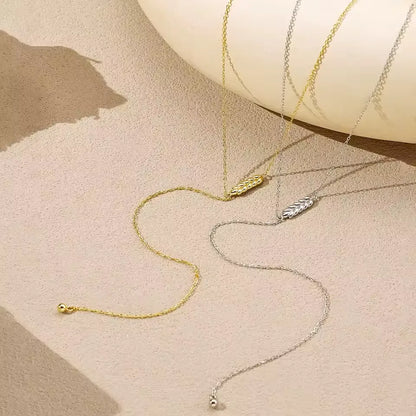 Des colliers sautoir épi de blé aylan en argent 925 plaqué or jaune et plaqué or blanc à plat.