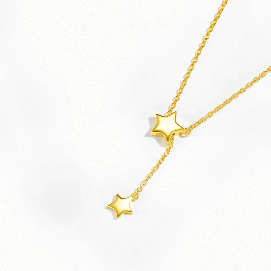 Détail des pendentifs du collier sautoir étoile amovible en argent 925 plaqué or jaune.