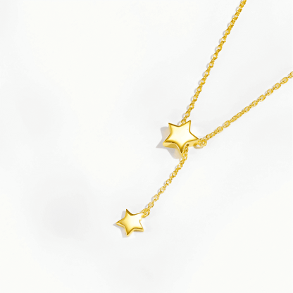 Détail des pendentifs du collier sautoir étoile amovible en argent 925 plaqué or jaune.