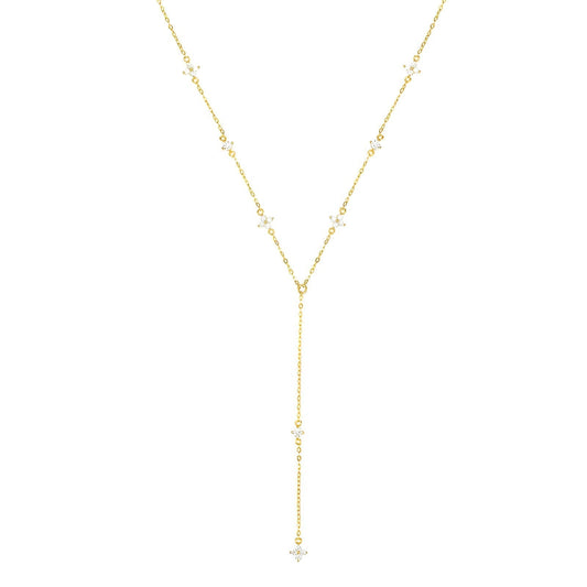 Sautoir fleurs maille dorée lumineuse en argent 925 plaqué or jaune et diamants sur fond blanc.